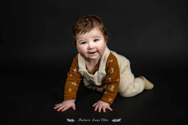 Photo bébé qui rigole – Portrait studio
